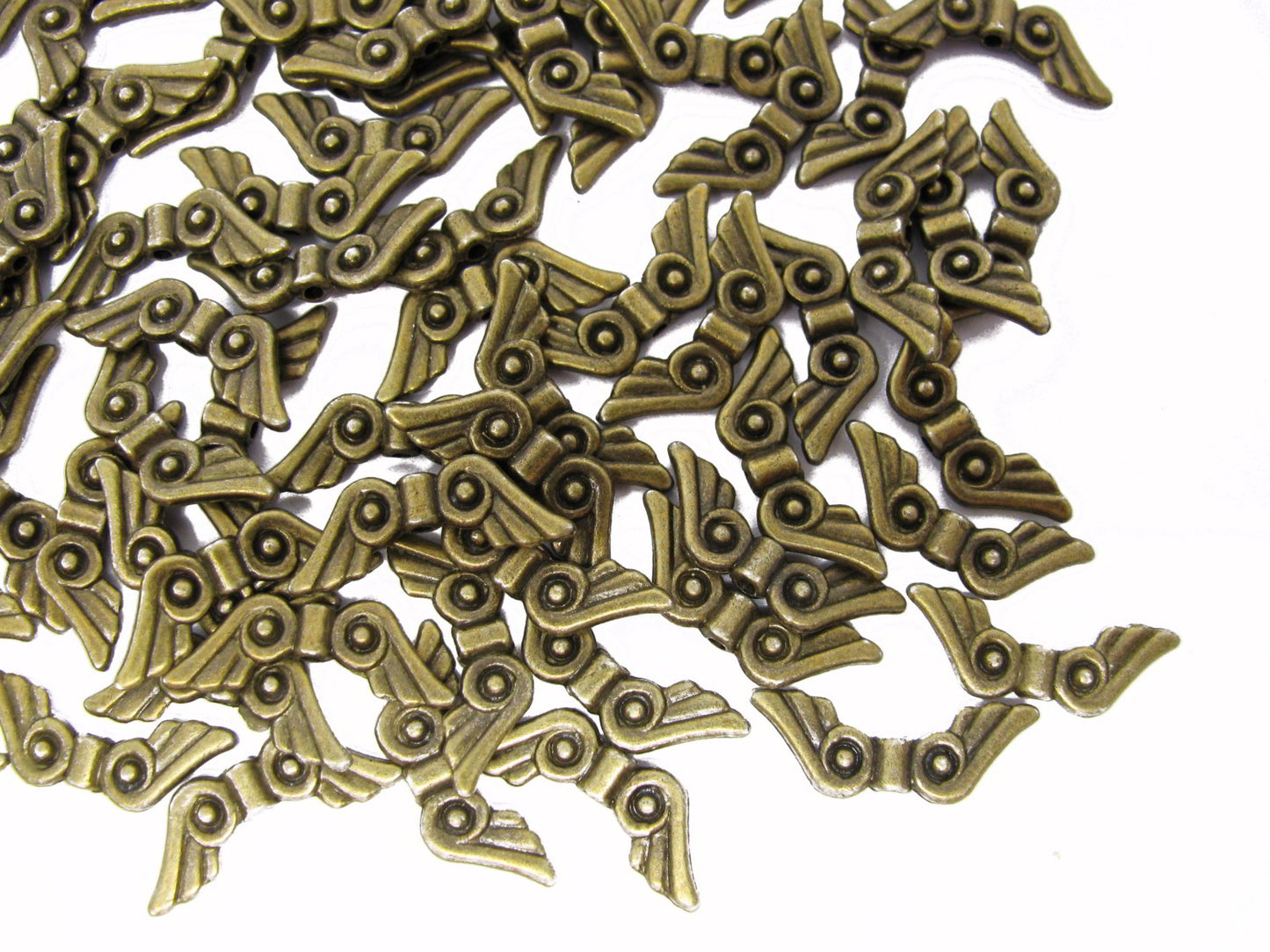 100 Engelsflügel Farbe Bronze, 21x7mm, Schmuck und Perlenengel basteln, fädeln