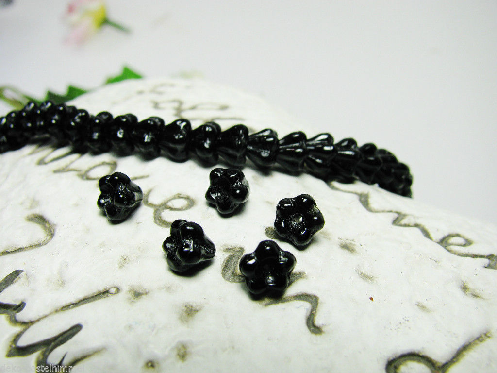 16 Blütenkelche schwarz opak, Glasperlen, 4 x 6 mm, Schmuck mit Perlen basteln